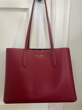 kate spade burgundy leather tote with gold logo